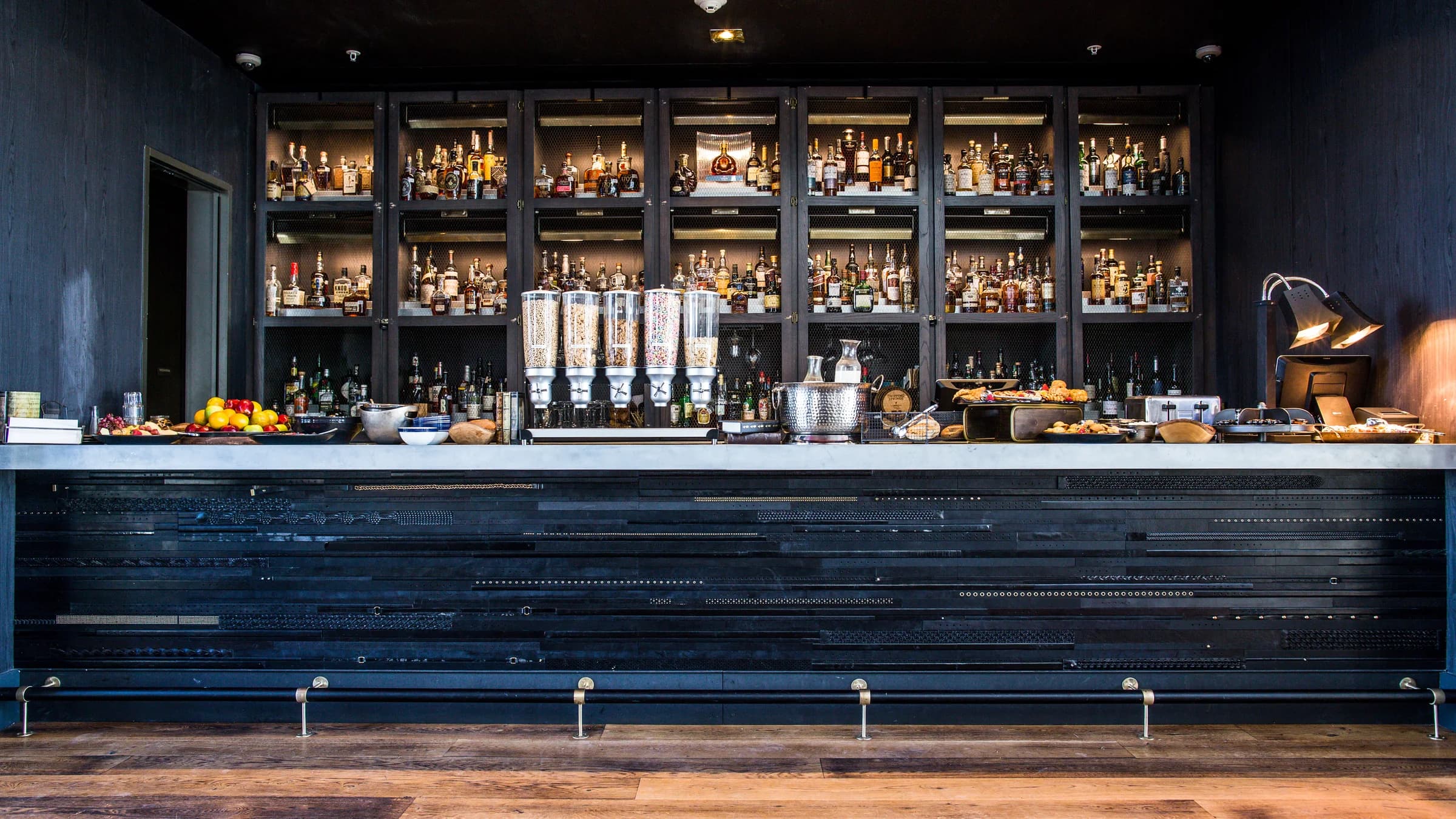 Black Phoenix belt panels on a restaurant bar.