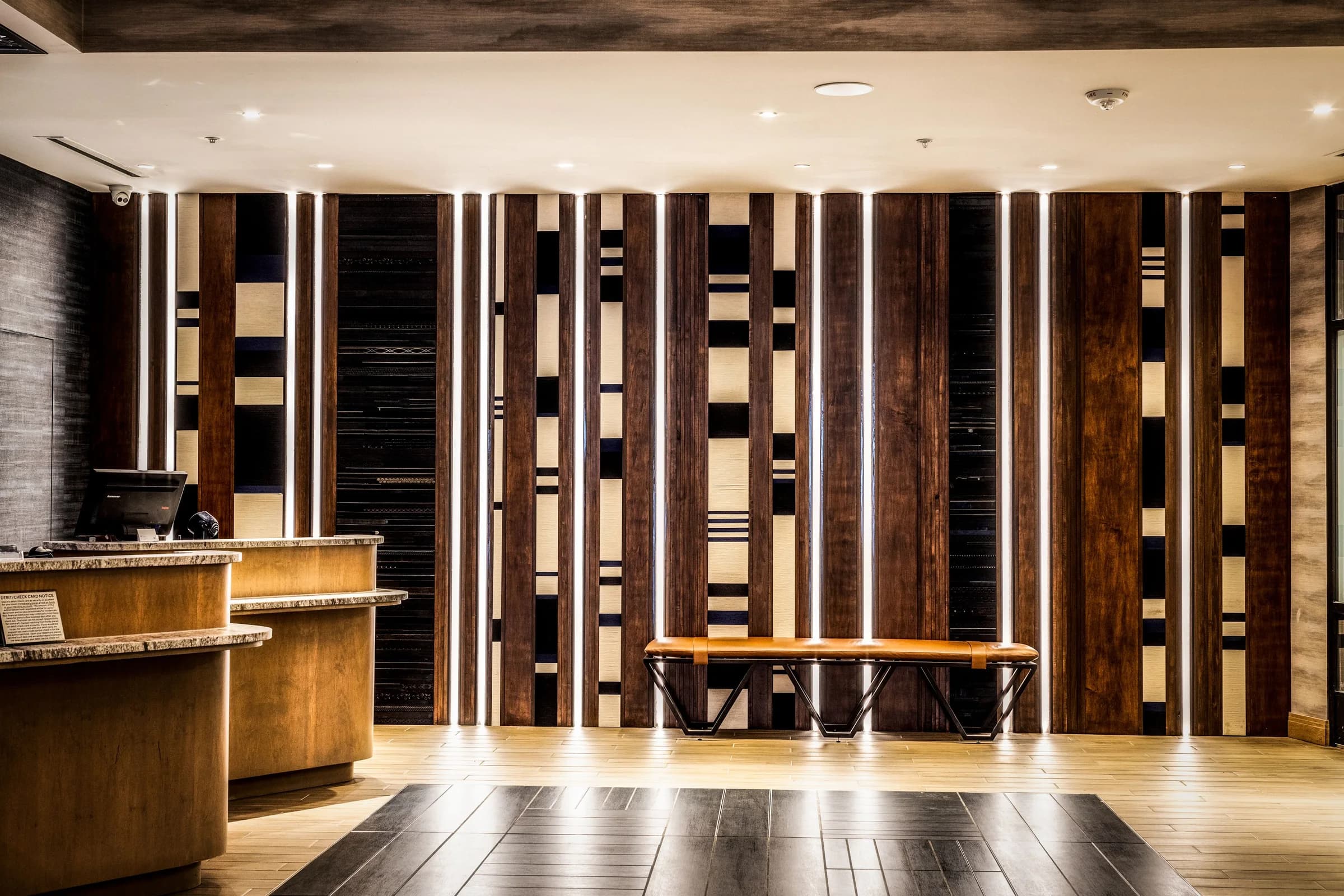 Phoenix belt panels in vertical bands around a lobby.