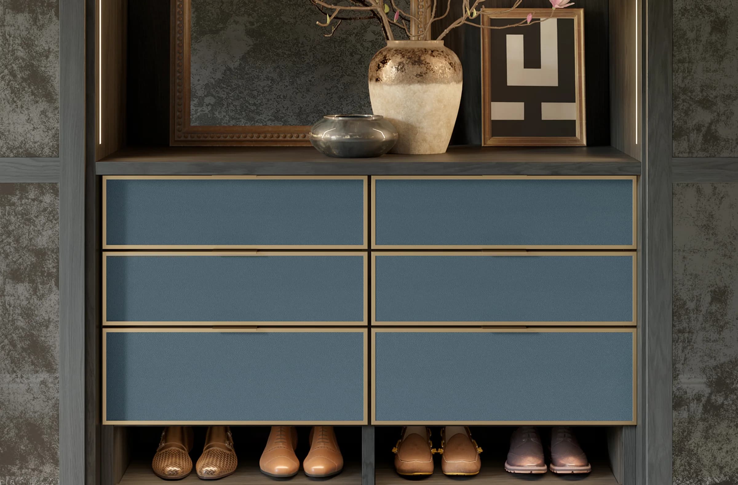 Built-in dresser with blue EcoDomo Cordova hide leather drawer fronts and brass trim.