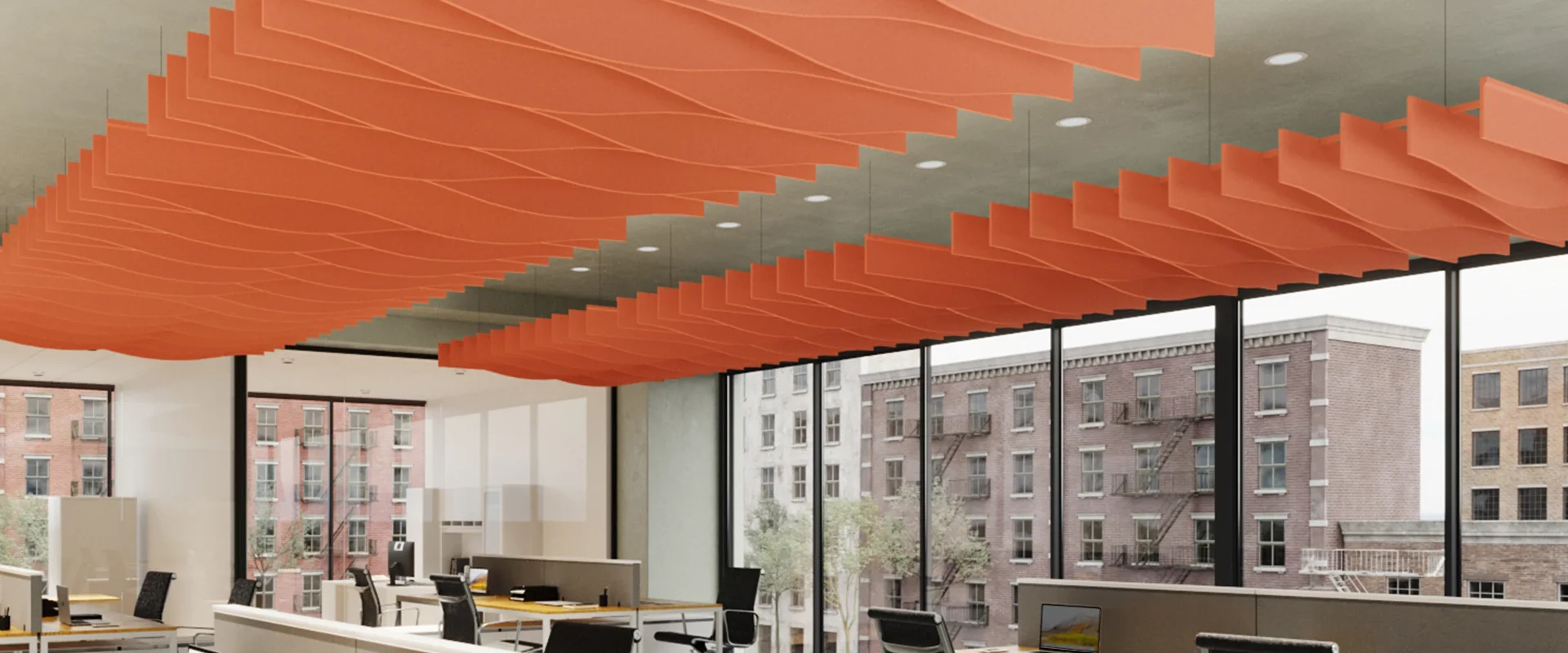 Orange Ezobord Baffle Clouds over an open office.