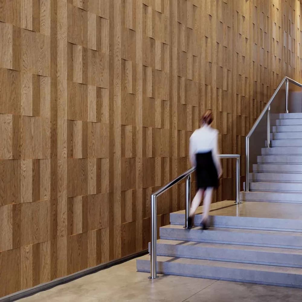 Staircase wall clad in Ezobord Rubik 3D woodgrain tiles.