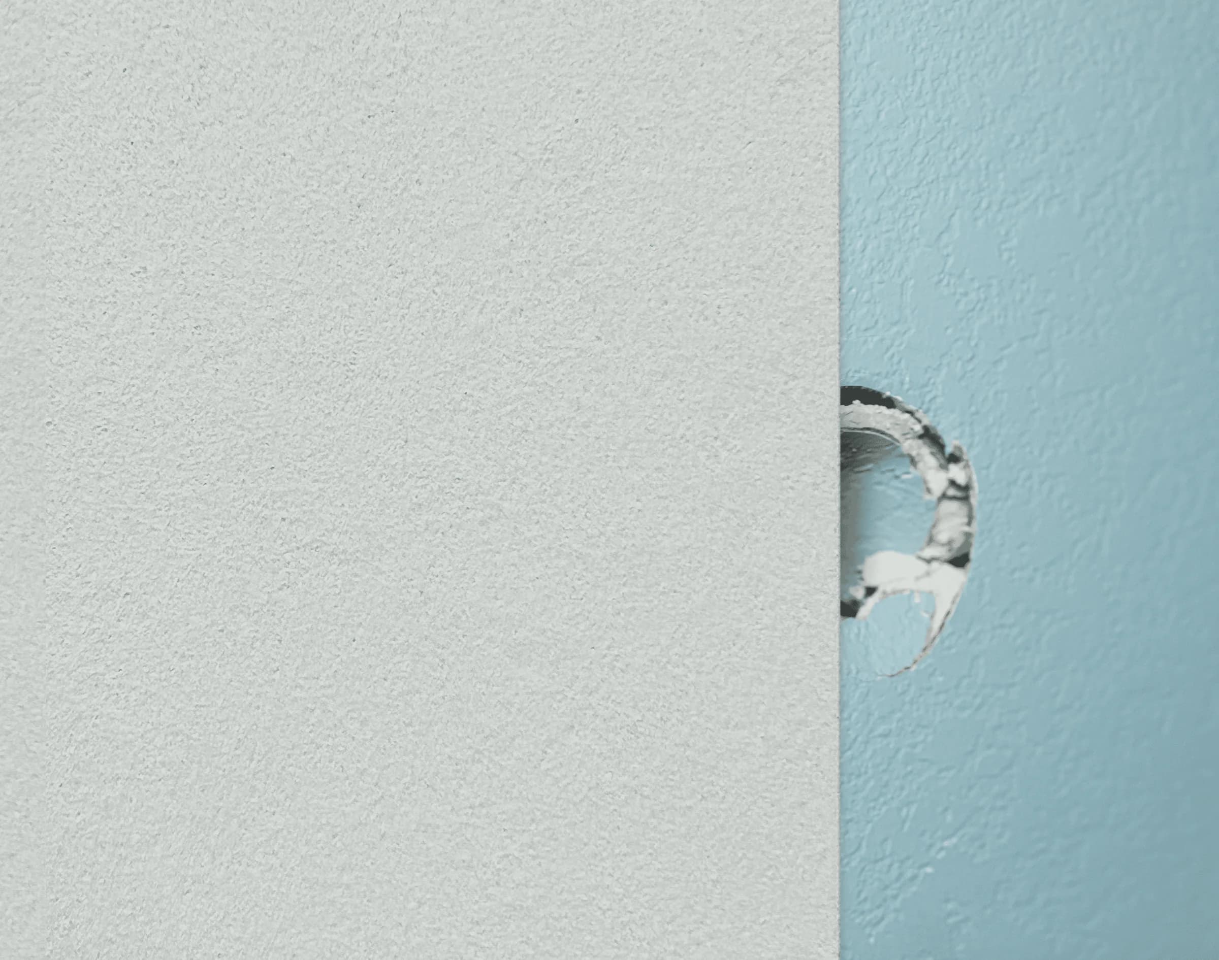 Smooth Texturglas restoration mat covering damaged drywall.