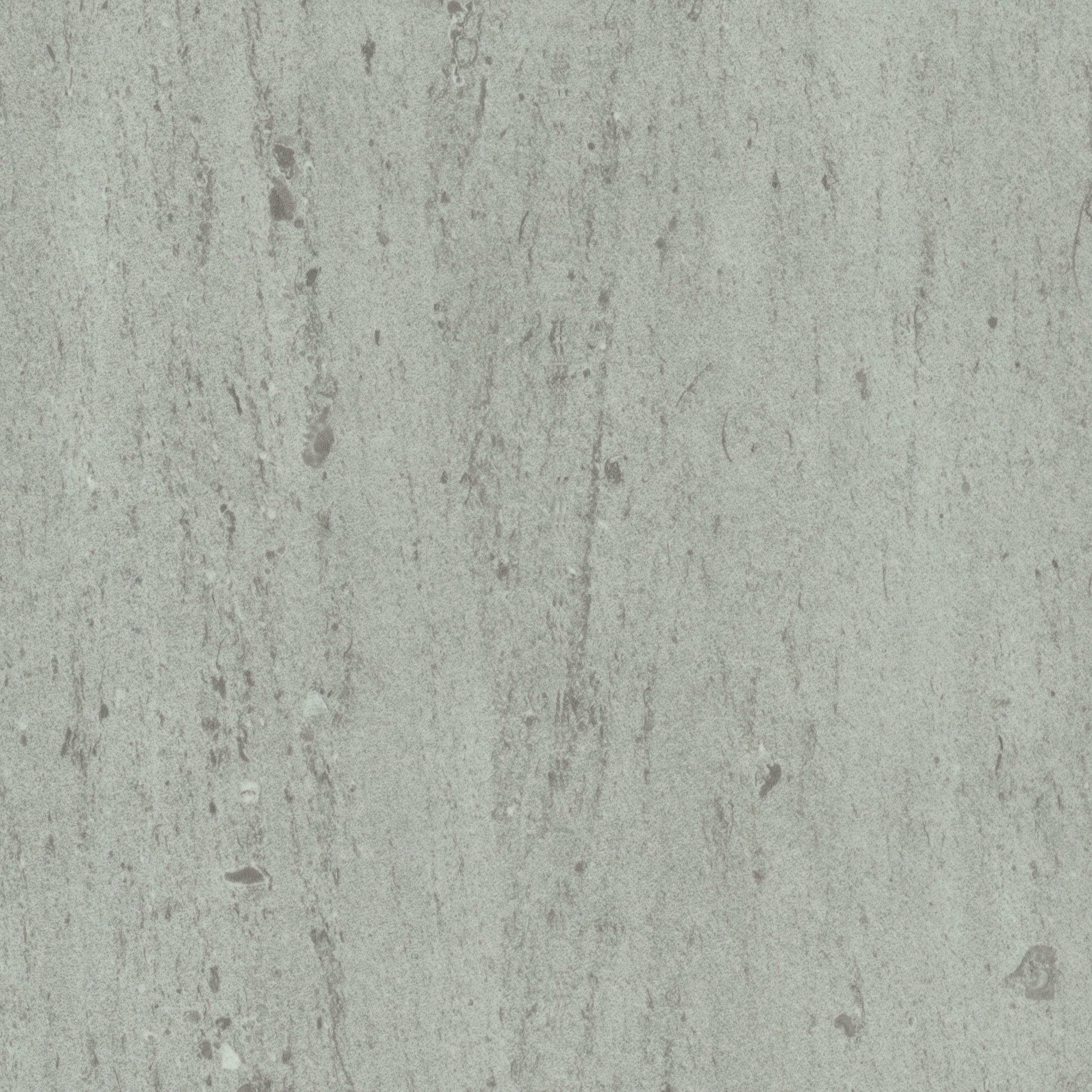 A stone-inspired laminate pattern in balanced neutral and mid-tone hues, defined by mineral-like movement, mottling, and natural tonal shifts