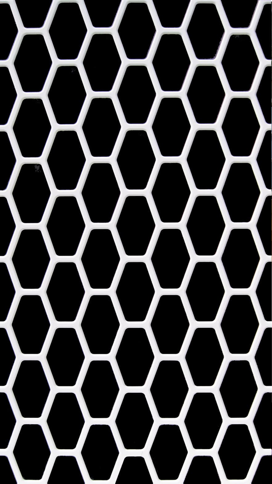 Interlam Carved Screens Honeycomb Customizable Color Options Carved Screens material sample.