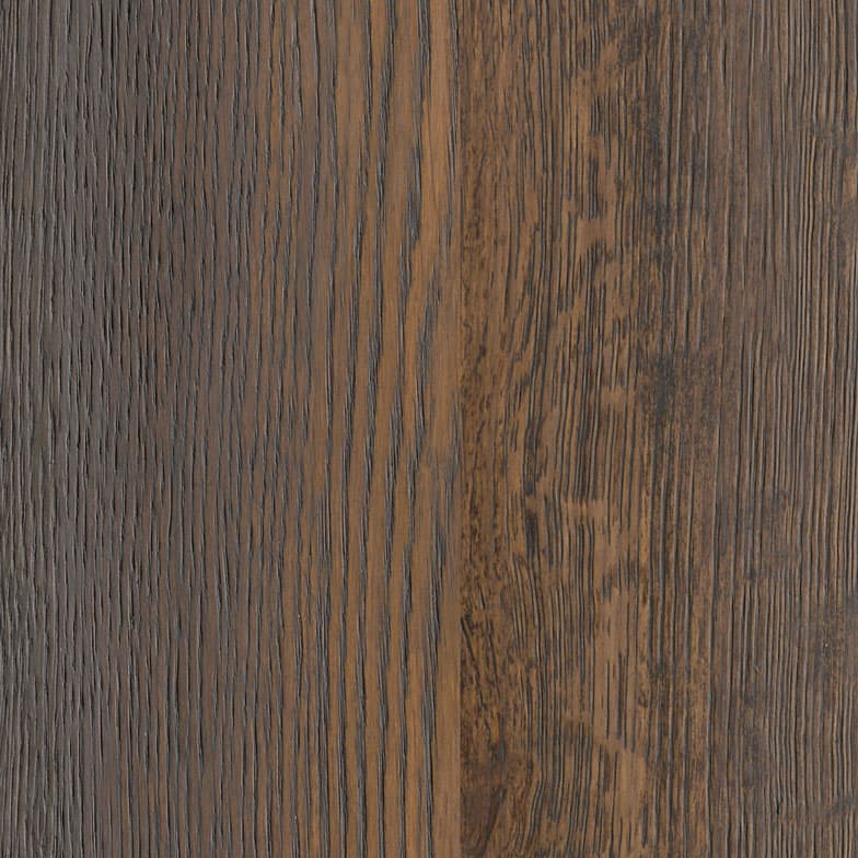 A woodgrain laminate pattern in balanced neutral and mid-tone hues, defined by natural grain movement and layered tonal variation