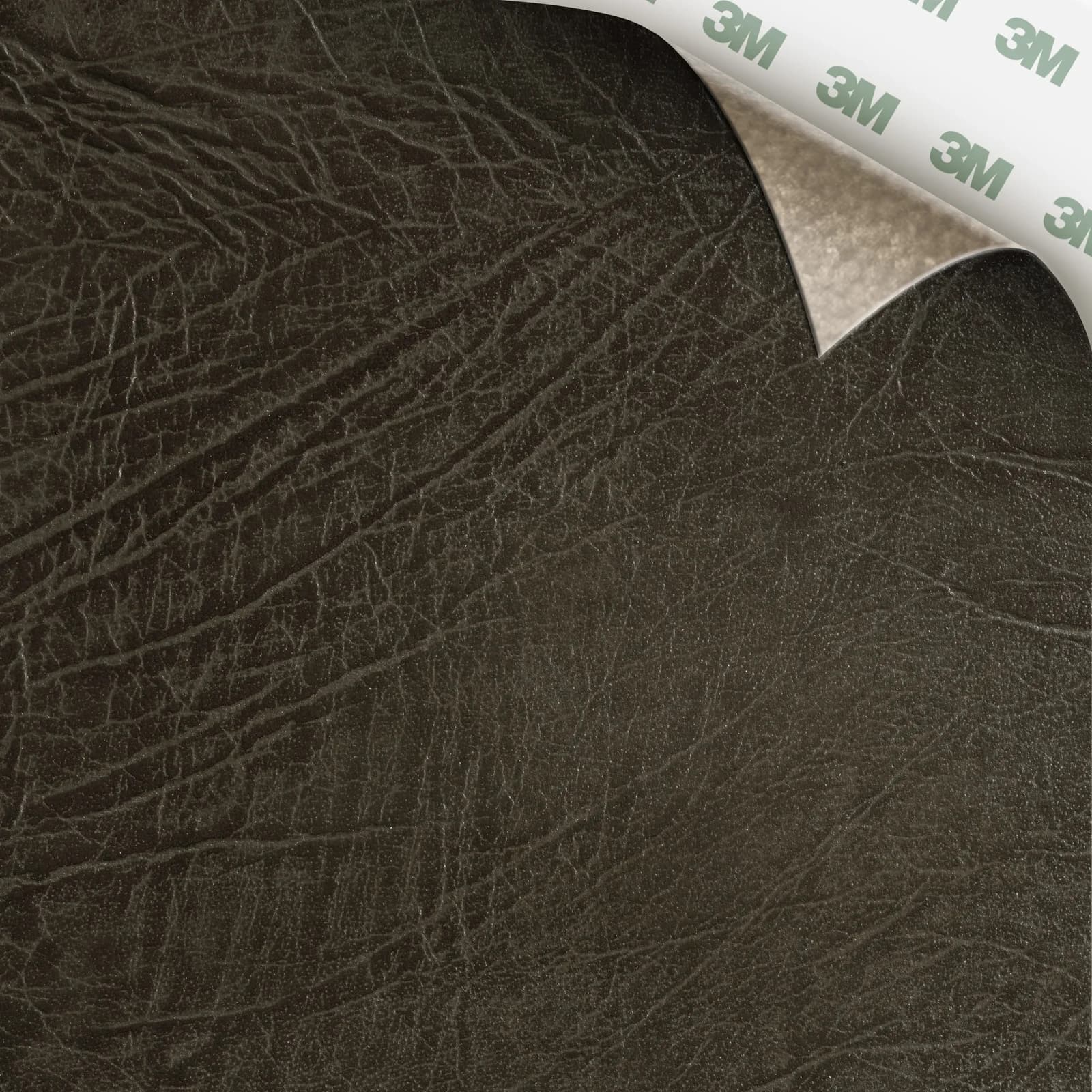 EcoDomo Stratto Umber Grey Buffalo swatch with the peel-and-stick backing showing.