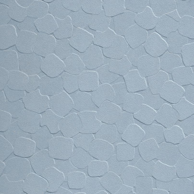 A geometric abstract laminate pattern in blue tones, defined by structured lines, repeated forms, and controlled visual rhythm