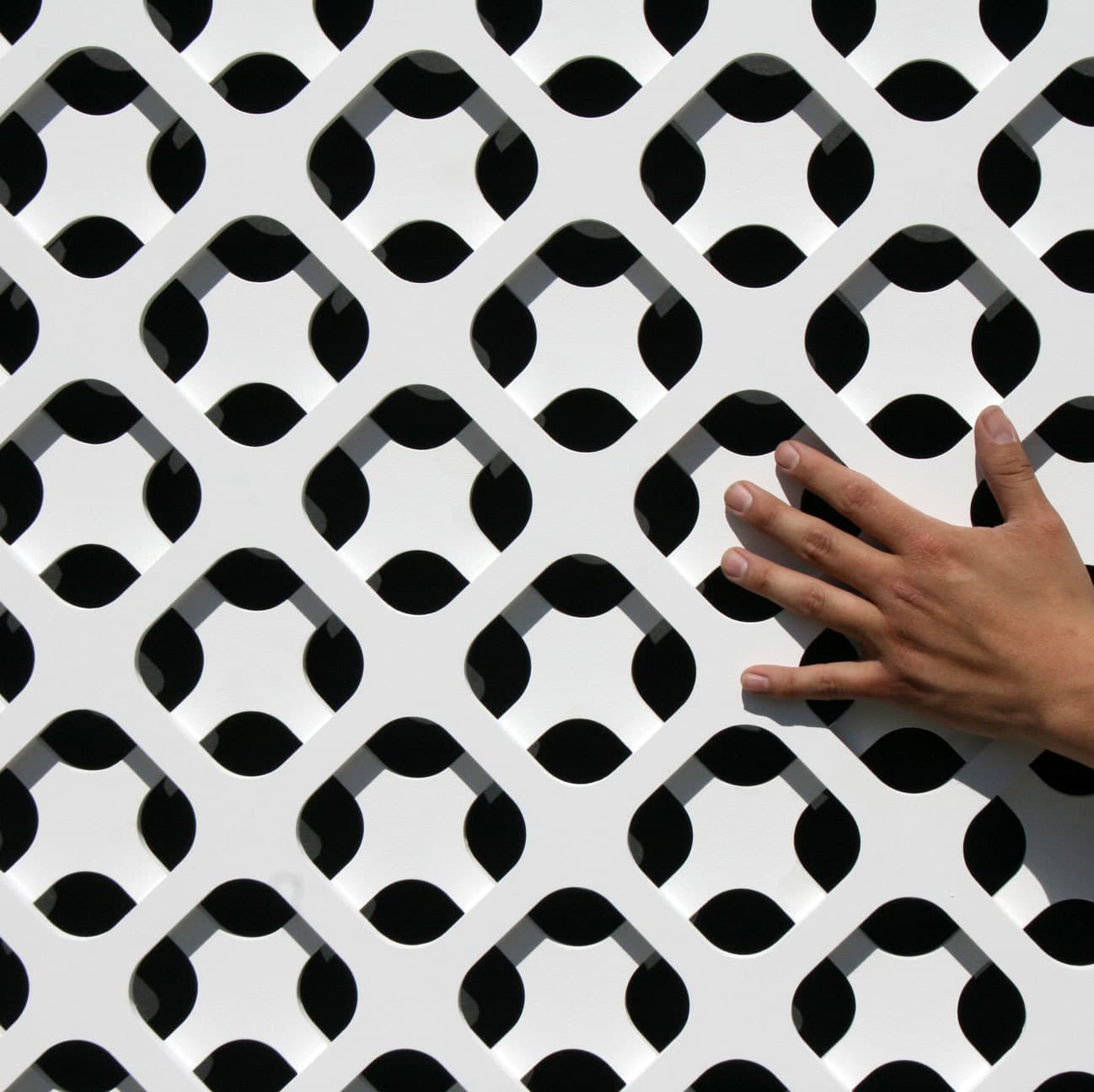 Interlam Carved Screens Diamond Customizable Color Options Carved Screens material sample.