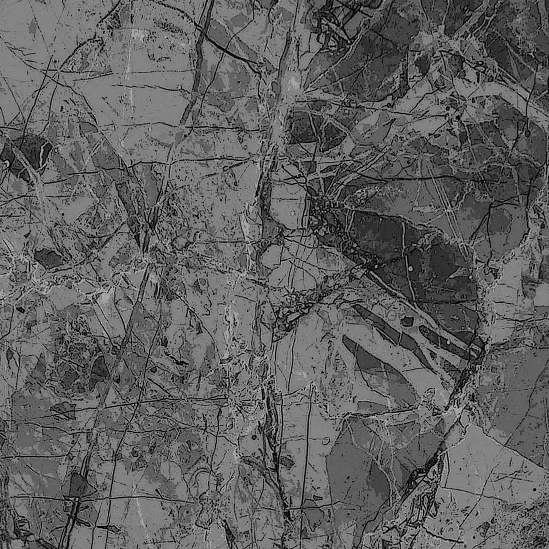 A stone-inspired laminate pattern in balanced neutral and mid-tone hues, defined by mineral-like movement, mottling, and natural tonal shifts