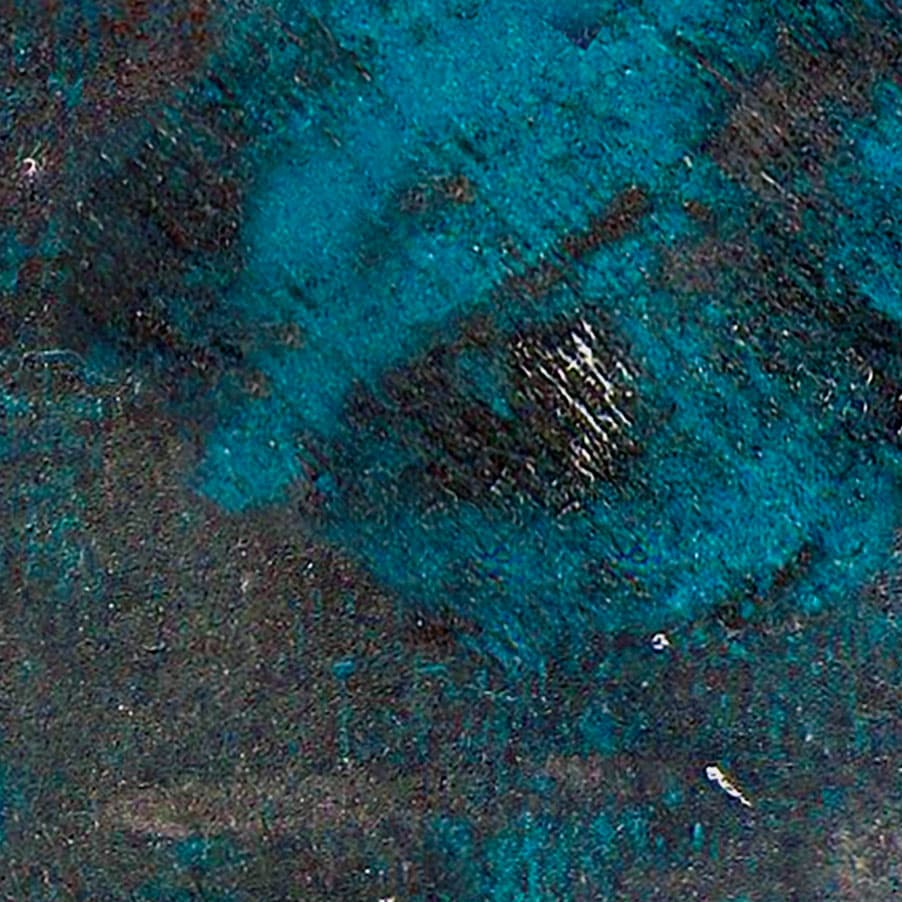 A metal-inspired laminate pattern in purple tones, defined by layered oxidation, brushed variation, and subtle reflective character