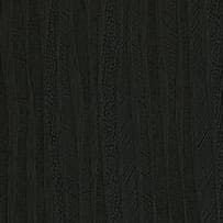 A botanical abstract laminate pattern in black tones, defined by organic silhouettes and softly layered natural movement