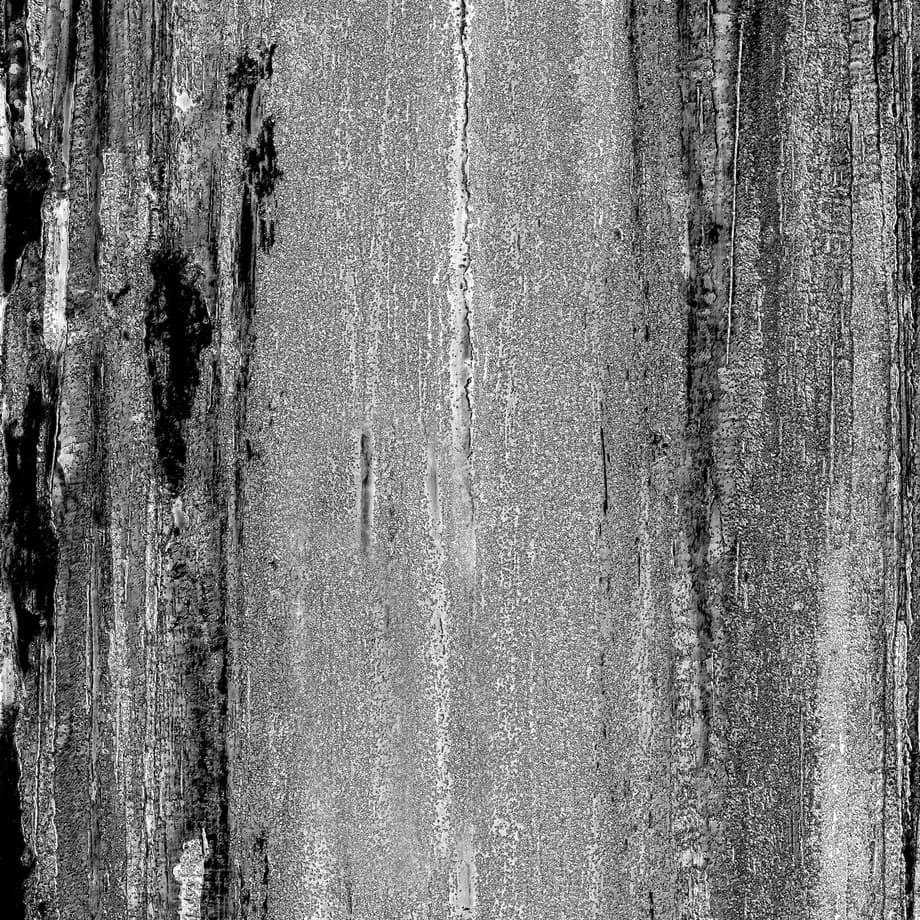 A woodgrain laminate pattern in balanced neutral and mid-tone hues, defined by natural grain movement and layered tonal variation