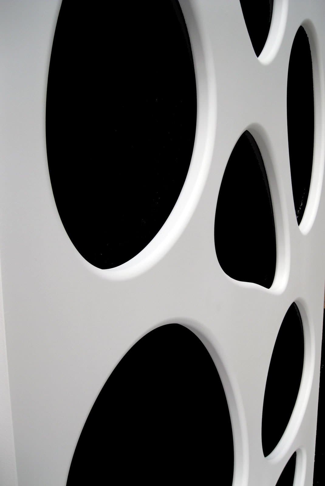 Interlam Carved Screens Big Eyes Customizable Color Options Carved Screens material sample.