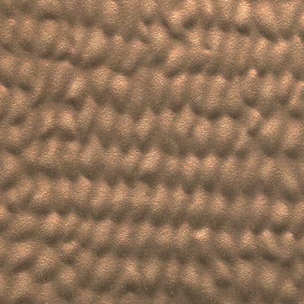 A metal-inspired laminate pattern in bronze tones, defined by layered oxidation, brushed variation, and subtle reflective character