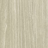 A woodgrain laminate pattern in silver-gray tones, defined by natural grain movement and layered tonal variation
