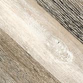 A woodgrain laminate pattern in brown tones, defined by natural grain movement and layered tonal variation