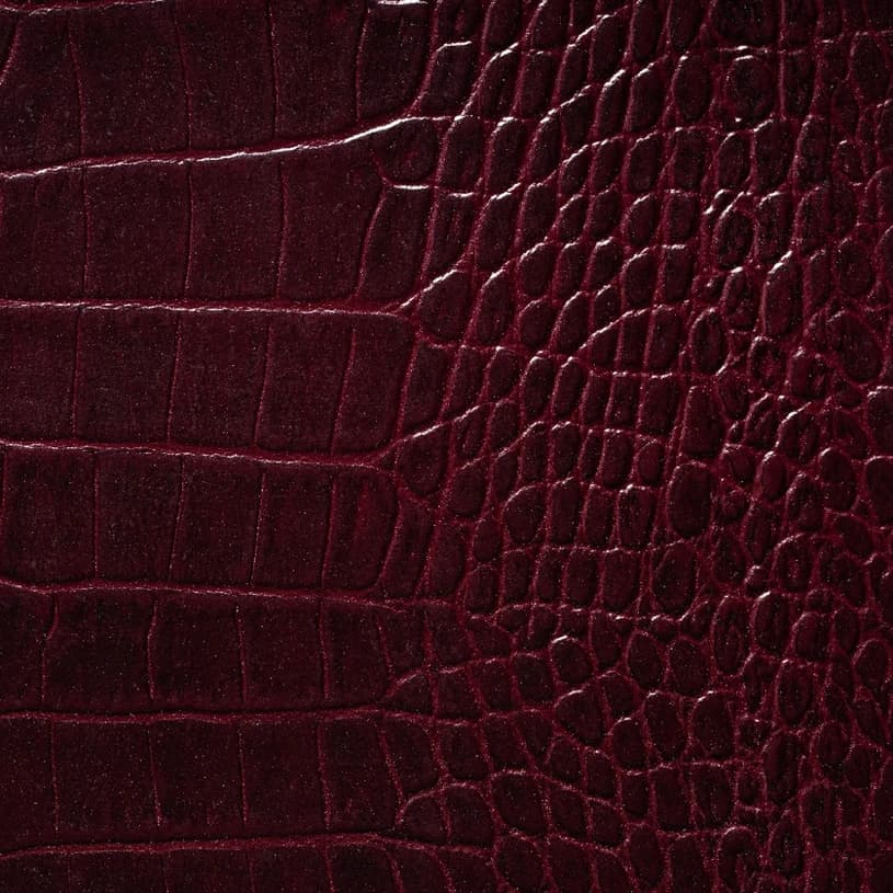 Ecodomo Burgundy Crocodile Leather material sample.