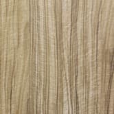 A woodgrain laminate pattern in balanced neutral and mid-tone hues, defined by natural grain movement and layered tonal variation