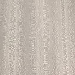 A woodgrain laminate pattern in gray tones, defined by natural grain movement and layered tonal variation