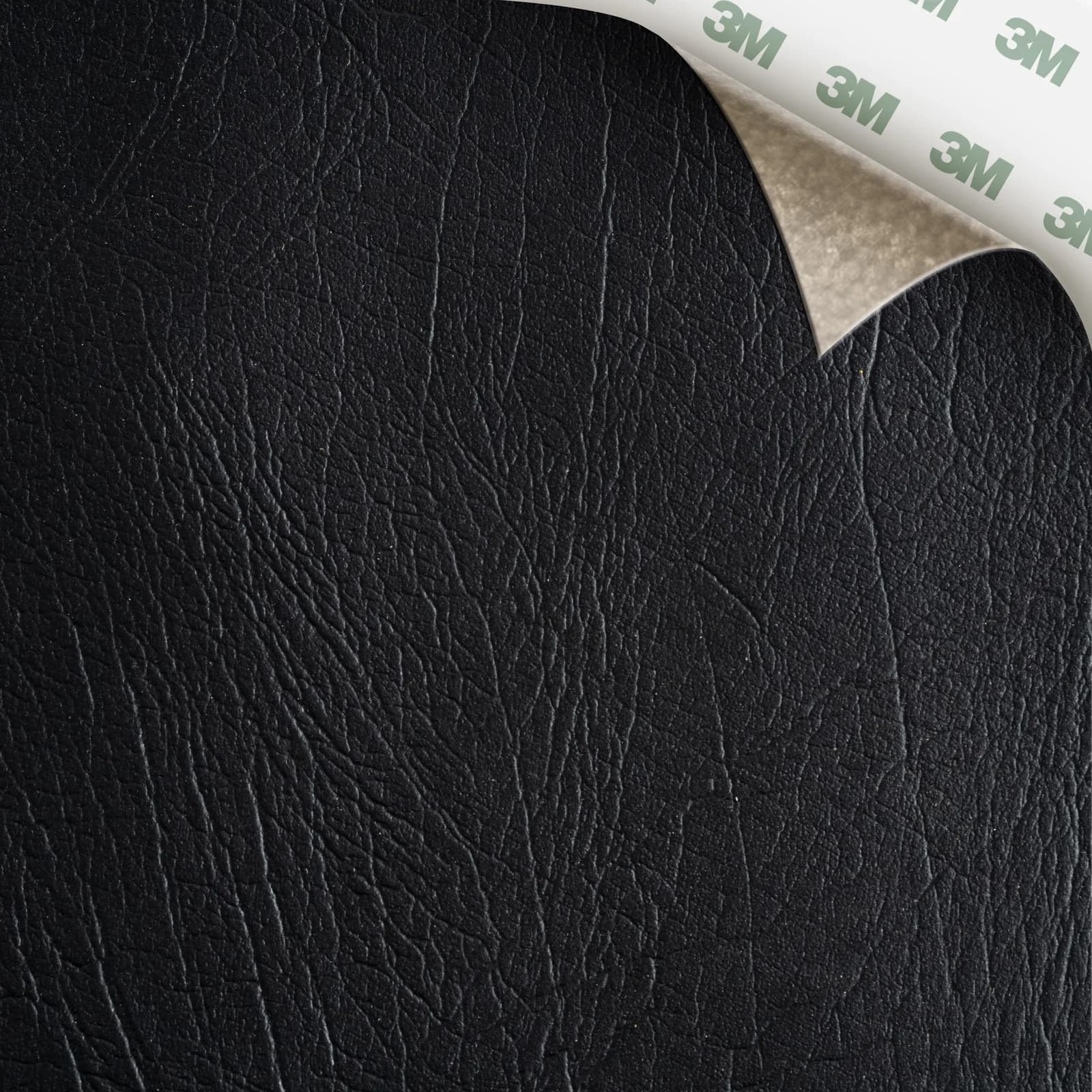 EcoDomo Stratto Coal Buffalo swatch with the peel-and-stick backing showing.