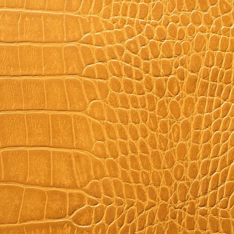 Ecodomo Toffee Crocodile Leather material sample.