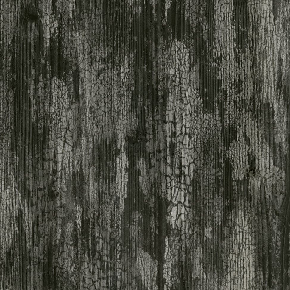An abstract laminate pattern in black tones, defined by layered marks, tonal variation, and restrained visual movement