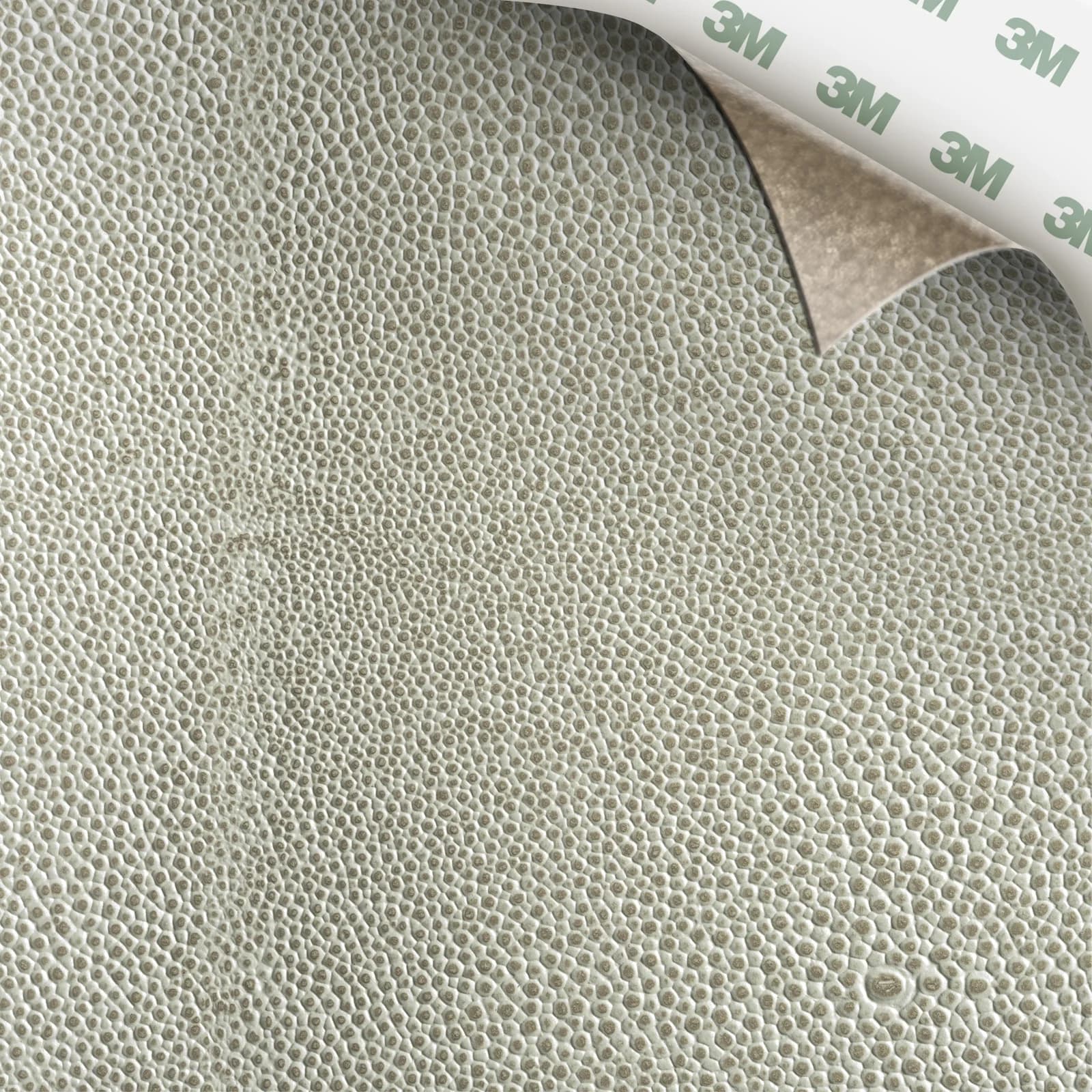 EcoDomo Stratto Grey Stone Shagreen swatch with the peel-and-stick backing showing.