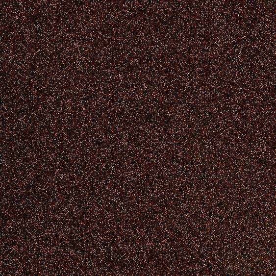 A metal-inspired laminate pattern in copper tones, defined by layered oxidation, brushed variation, and subtle reflective character