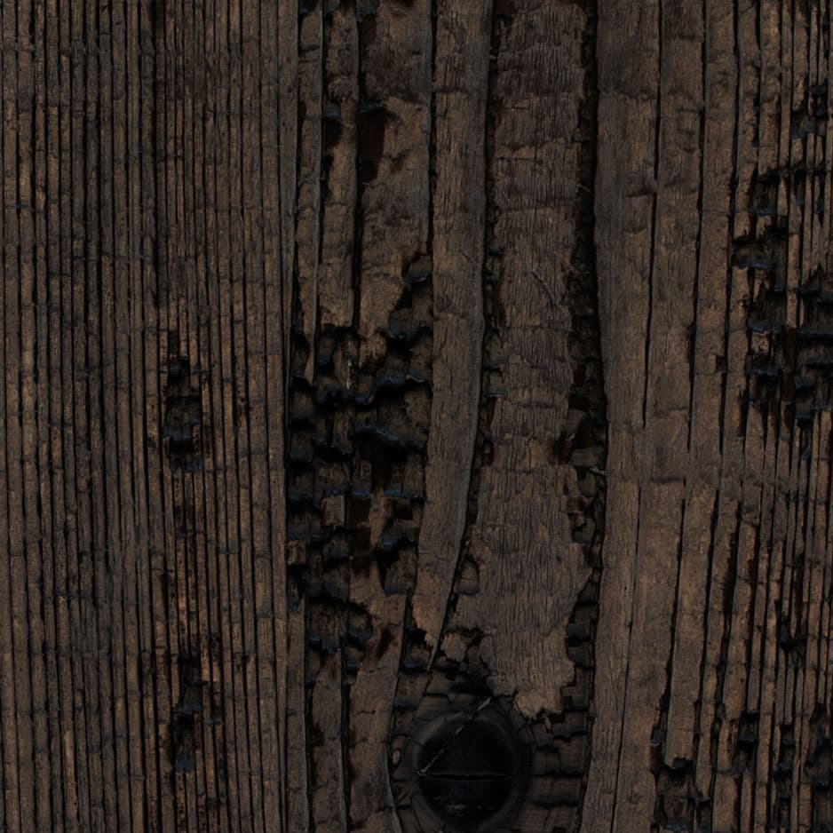 A woodgrain laminate pattern in natural neutral and weathered mid-tone hues, defined by natural grain movement and layered tonal variation