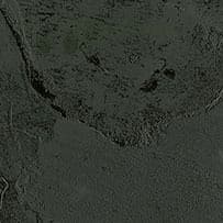 A stone-inspired laminate pattern in black tones, defined by mineral-like movement, mottling, and natural tonal shifts